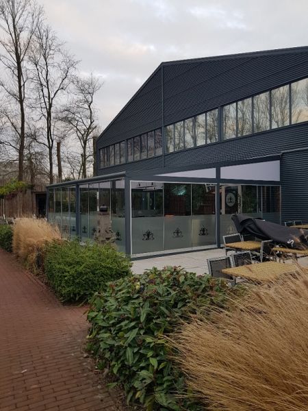 Tuinkamer met glasschuifwanden